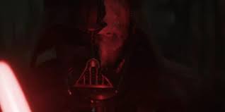 A picture of Darth Vader with a cracked helmet from the Kenobi series