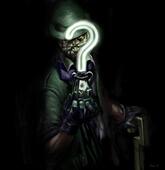 Riddler holding a trophy